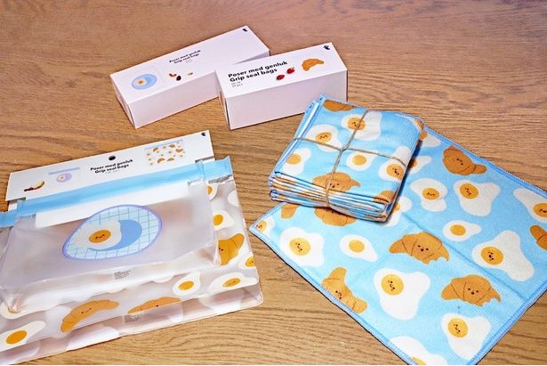 写真左から時計回りに「フードバッグ」(2枚セット550円)、「ランチバッグ」(各20枚入り275円)、「マイクロファイバークロス」(5枚セット385円)