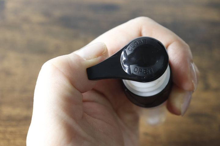 ポンプヘッドのロック部分「CLOSE」の文字が見える状態