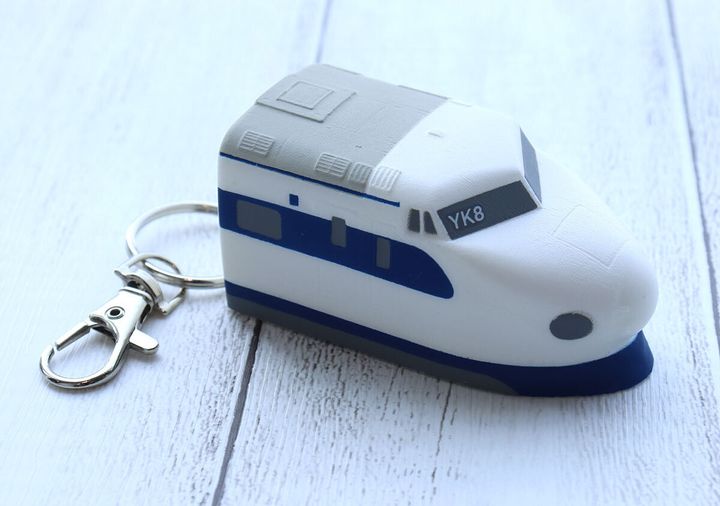 新幹線0系の形をした白いスクイーズキーホルダー
