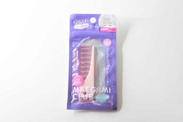 「ゆるふわシースルーコーム」と書かれた紫色のパッケージ