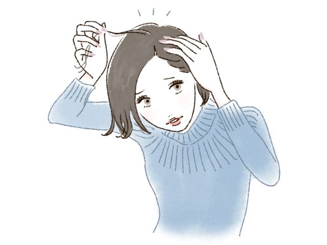 髪の毛が気になる女性