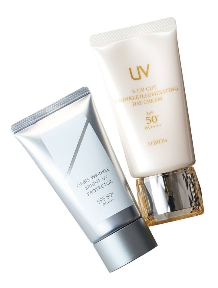 （右）シワ改善と高いUV効果を搭載。S-UVカット リンクル イルミネイティング デイクリーム［医薬部外品］SPF50+ PA++++ UV耐水性★ 50g ¥11,000／アルビオン （左）シワ改善と美白のダブルケアで、大人の肌を守り抜く。オルビス リンクル ブライト UV プロテクター N［医薬部外品］SPF50+ PA++++ 50g ¥3,850／オルビス