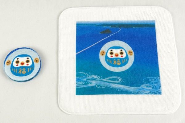 水に入れるとハンカチに変身！「ふくだるま」を使った、新しい山口土産が登場