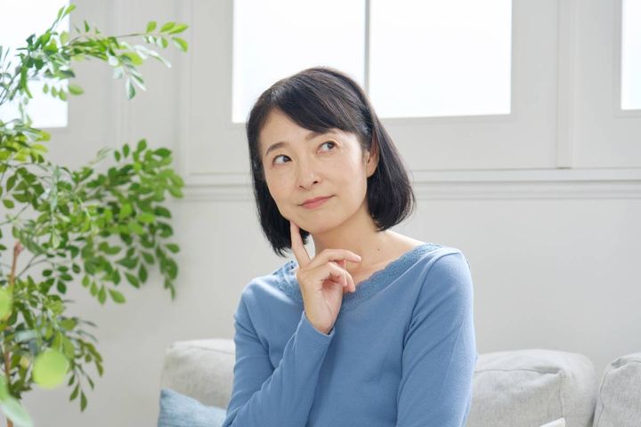 考える人