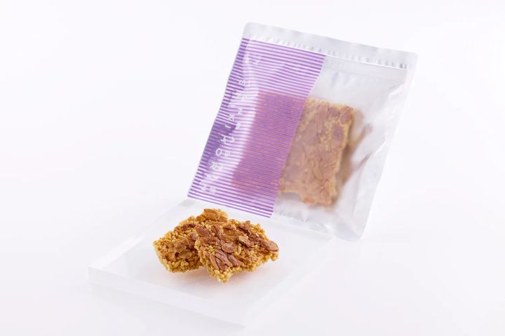 「okoshi+ フロランタン」70gの紫ストライプパッケージ