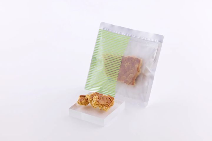 「okoshi+ フロランタン」30gの緑ストライプパッケージ