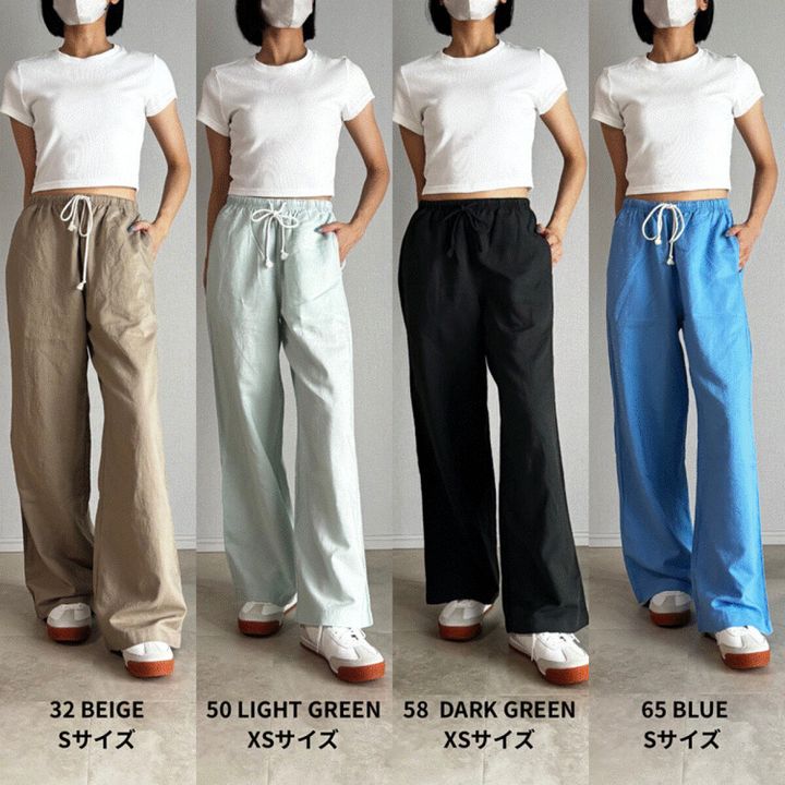 ユニクロリネンパンツ4色を着用した女性が並ぶ全身