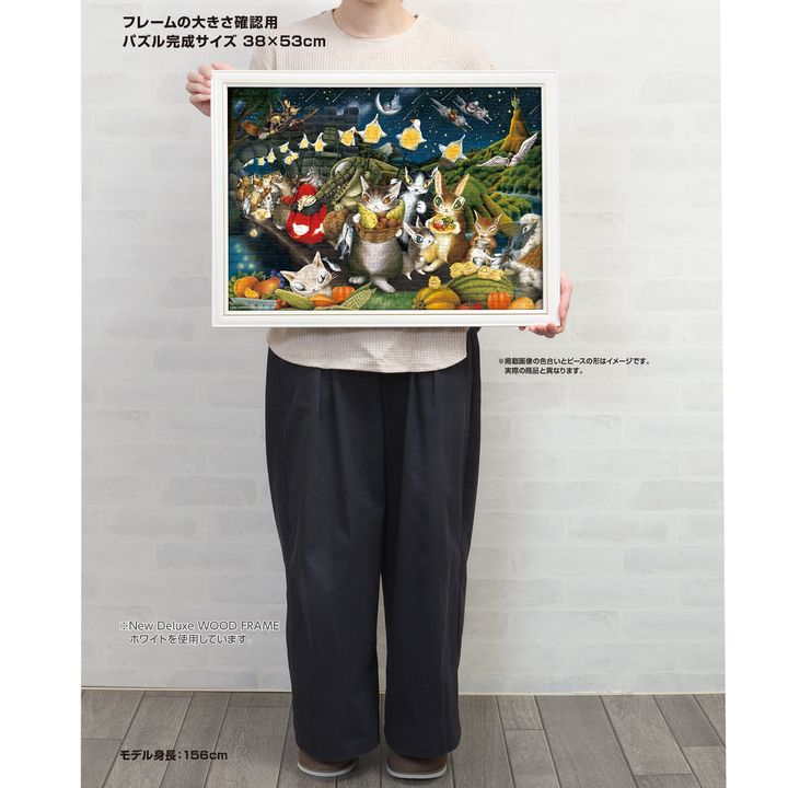 額装した『カシガリ山の収穫祭』の完成サイズ見本