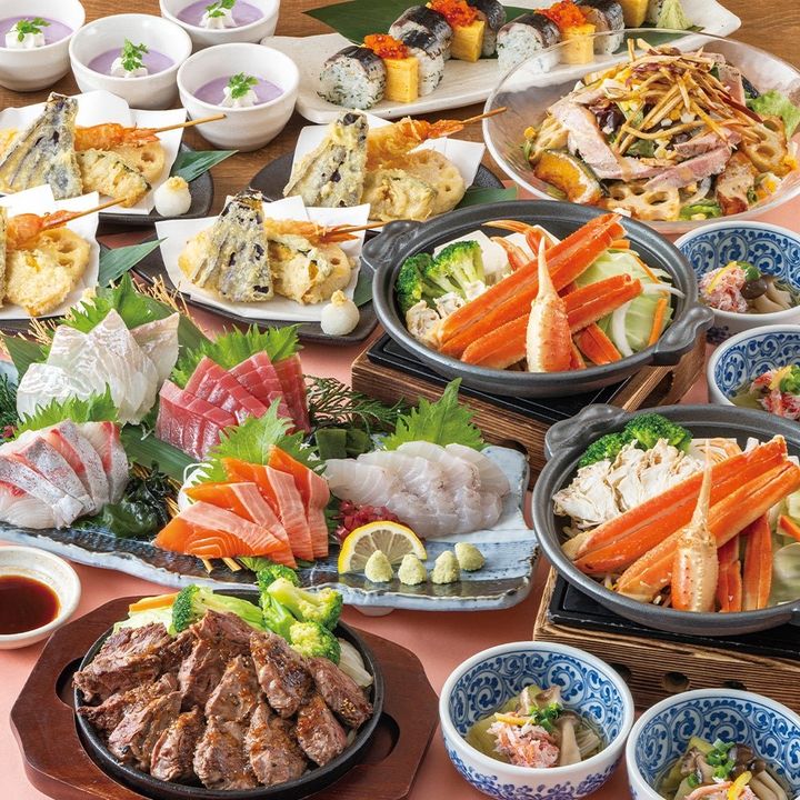 6,500円コースの天ぷらと蟹陶板蒸しなど