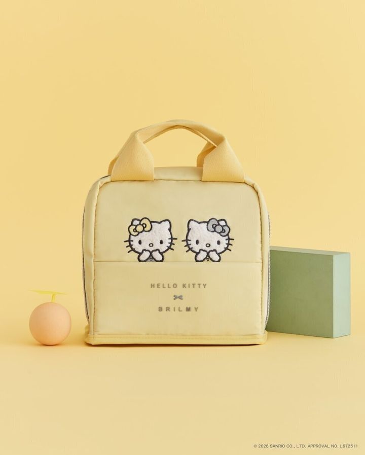 黄色いハローキティとリボンの刺繍入りスタンドポーチ