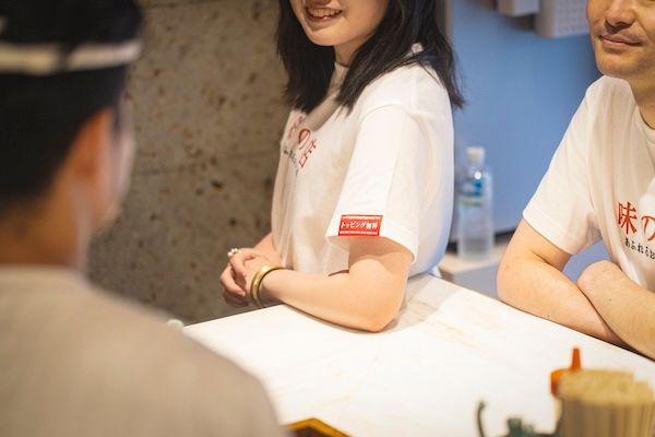 着るだけで、ちゃんのれん組合加盟店ラーメンのトッピングが無料になる「トッピング無料Tシャツ」登場
