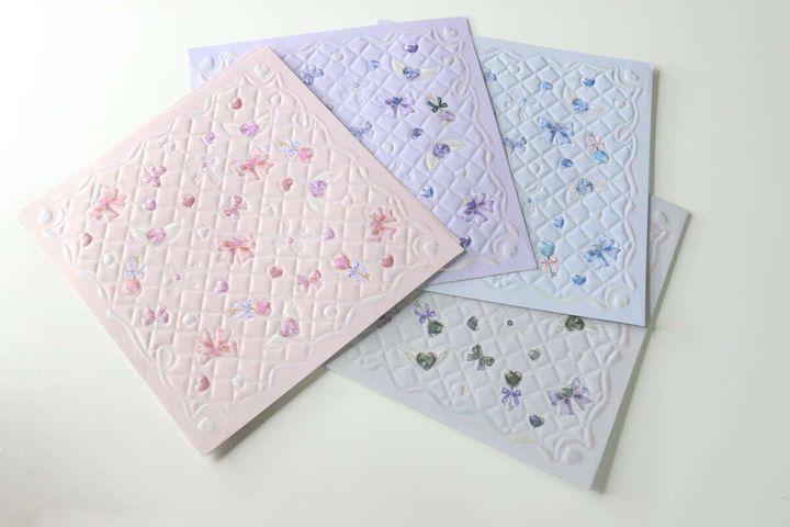 ピンク、紫、水色、グレーの4色のきらきらジュエルデザインペーパー