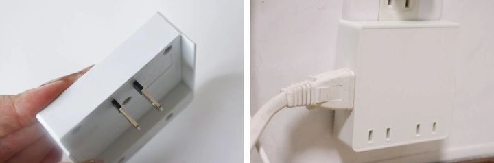 白い四角い電源タップを女性の手のひらに乗せて見せている