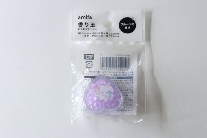 「amifa 香り玉 キラキラアニマル」のパッケージ全体。紫色のハート型ケースが見える。