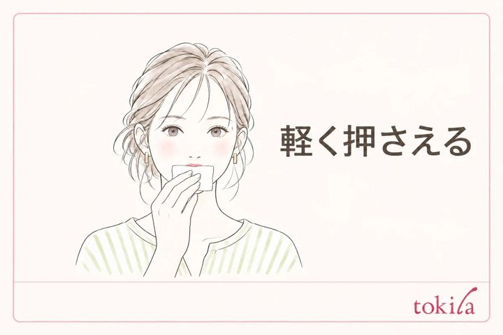 ティッシュを唇に軽く押さえる動作を示した線画イラスト