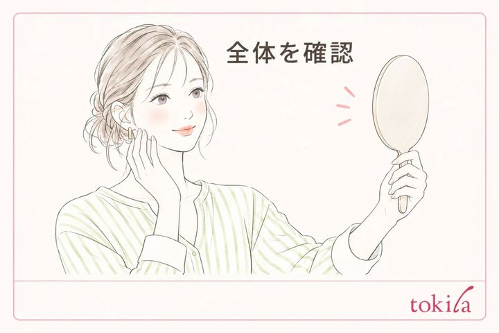手鏡を少し離し、顔全体の色合わせを確認する女性のイラスト