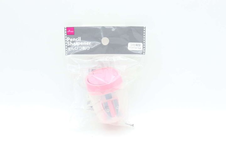 透明な袋に入ったピンク色のゴミ箱型鉛筆削り