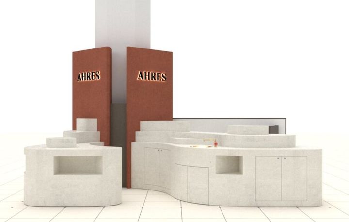 大丸心斎橋店に出店する「AHRES 大丸心斎橋店」の店舗イメージ。ロゴを掲げた赤茶色の什器とカウンター