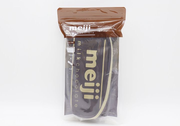 透明な袋に入った明治ミルクチョコレートデザインのポーチ
