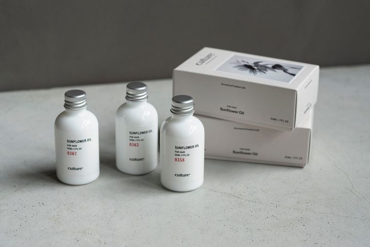 OSAJI culture サンフラワーヘアオイルのボトルとパッケージ